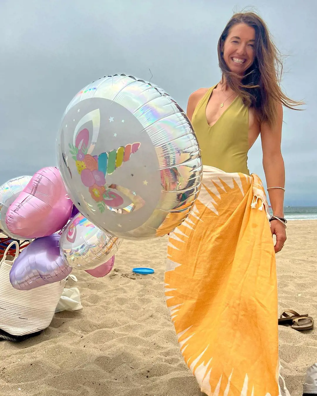Shallow and her daughter at beach birthday party in July 2022
